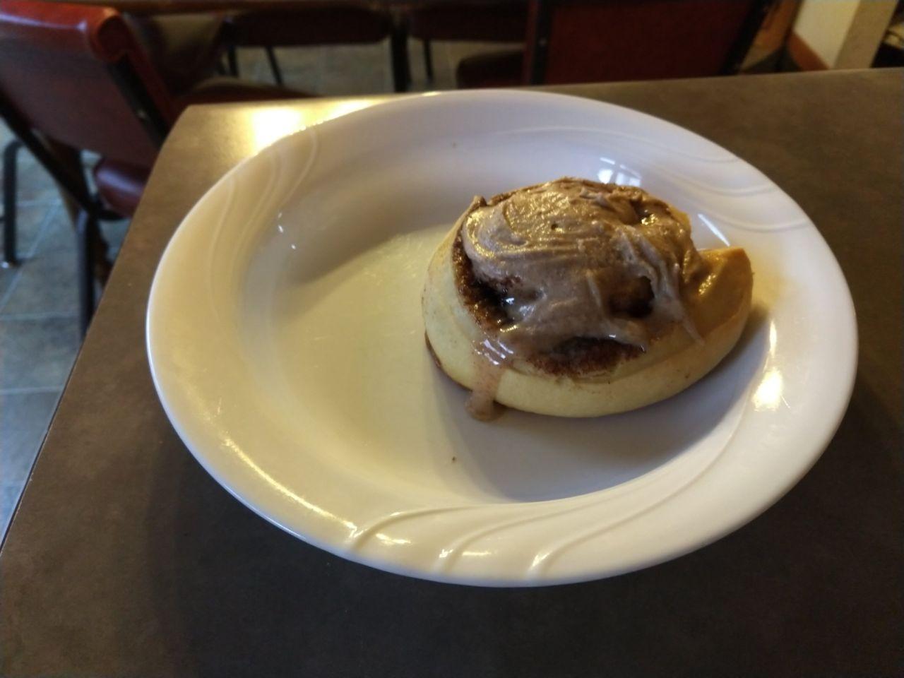 Cinnamon roll with frosting. Cinnamon roll with frosting.