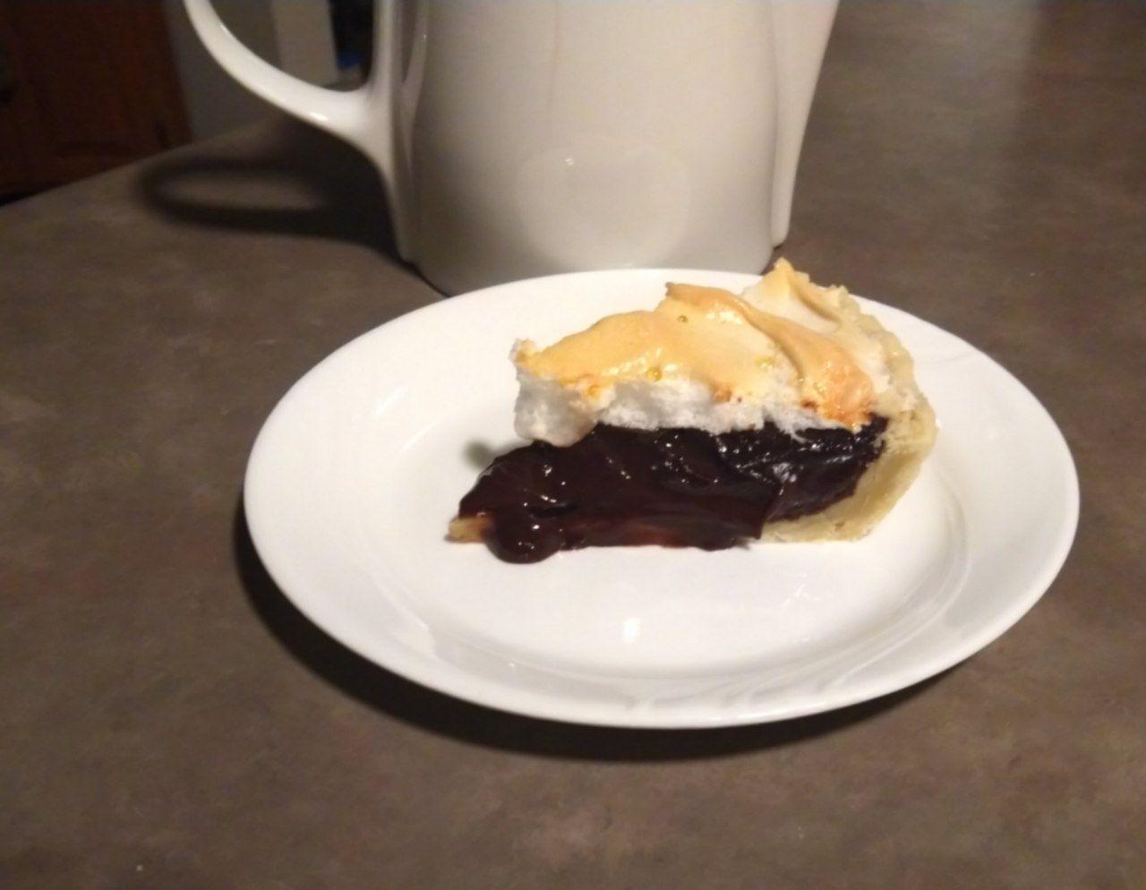 Slice of cocoa pie on a plate. Slice of cocoa pie on a plate.