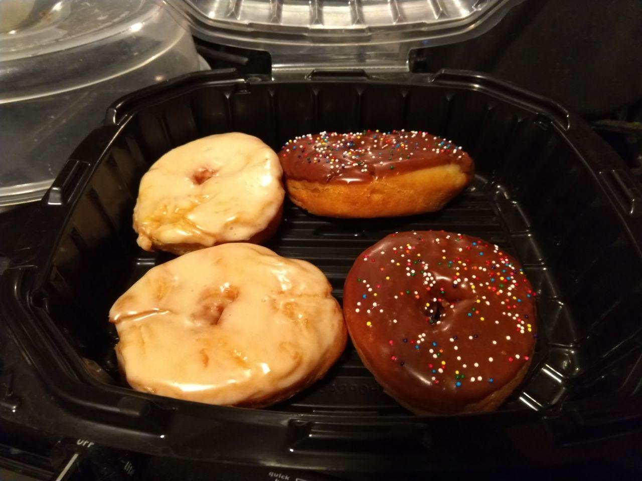 Homemade donuts with different kinds of glaze. Homemade donuts with different kinds of glaze.