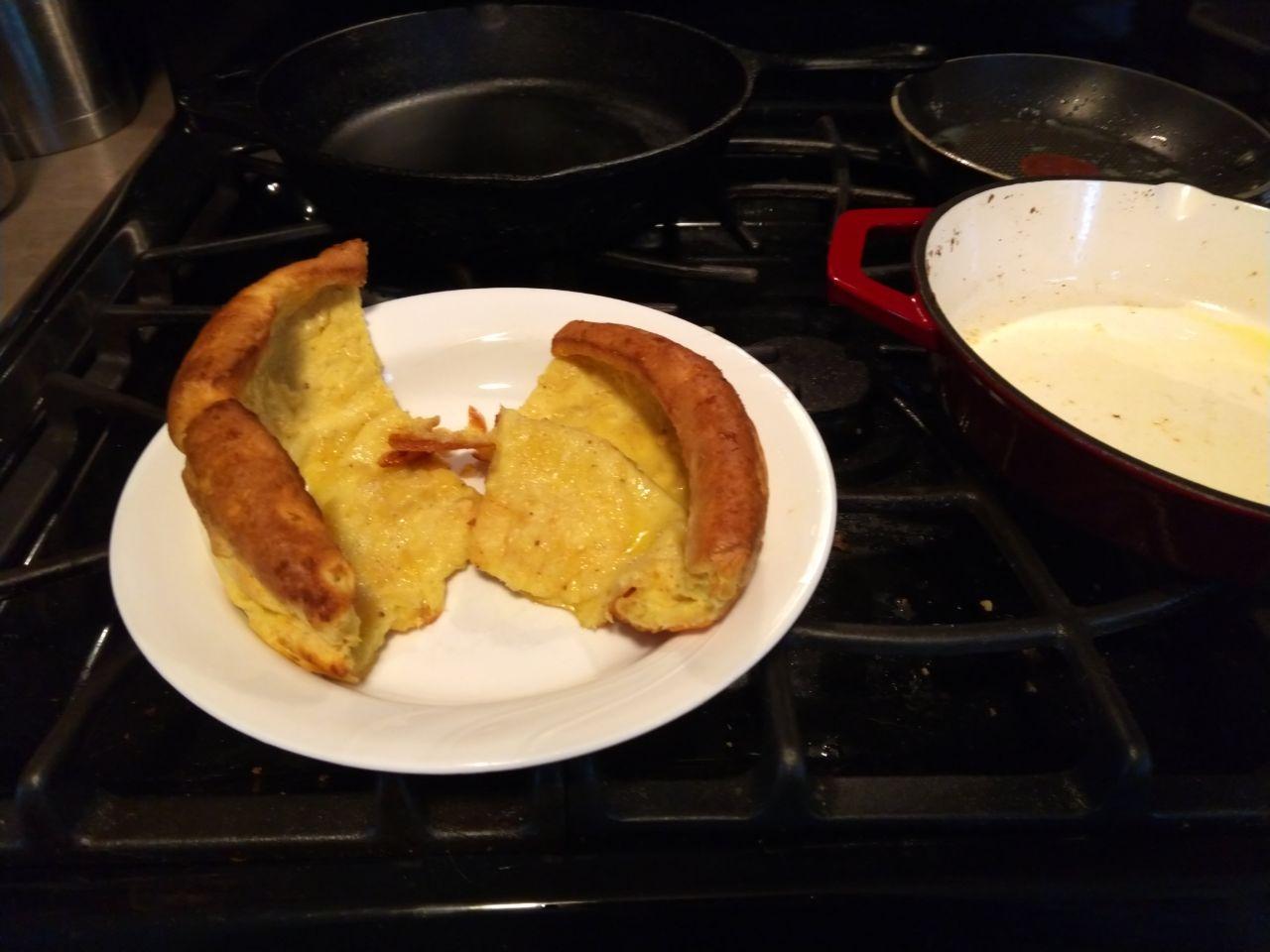 Two quarters of a dutch baby. Two quarters of a dutch baby.