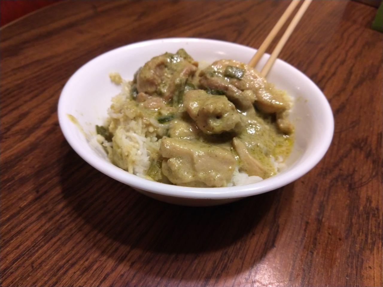 Bowl of green curry on rice. Bowl of green curry on rice.