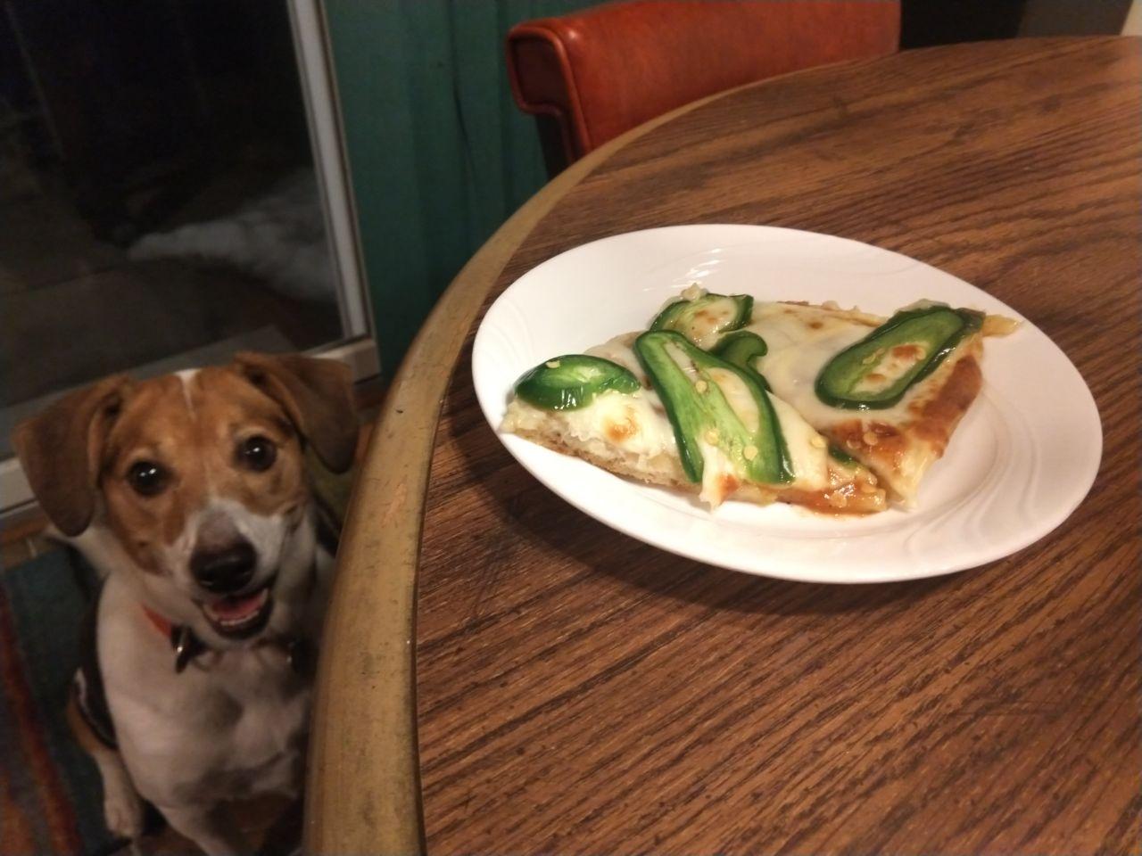 Jalapeno pizza with honey in the sauce.