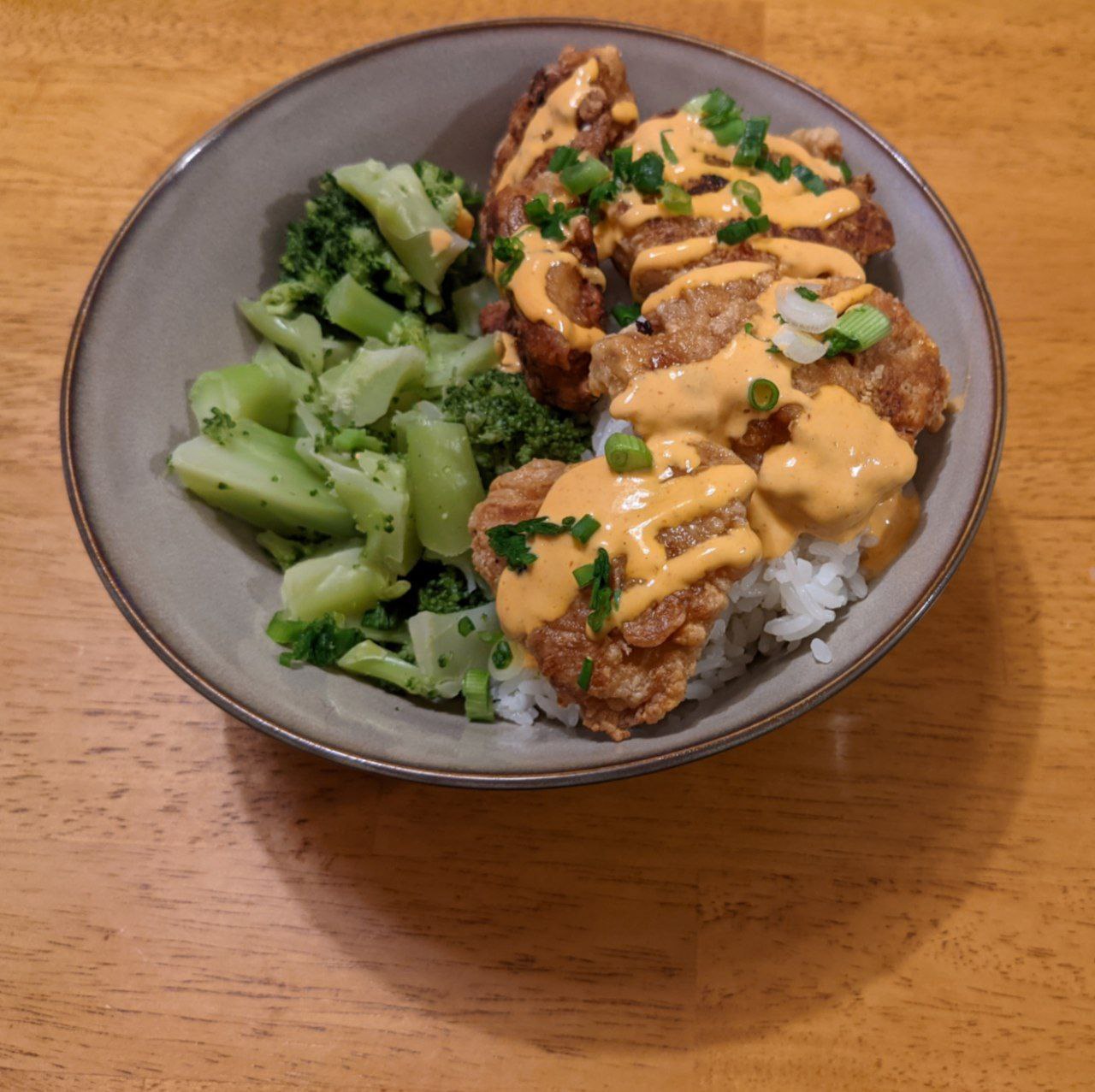 Bowl of mochiko chicken with spicy mayo. Bowl of mochiko chicken with spicy mayo.
