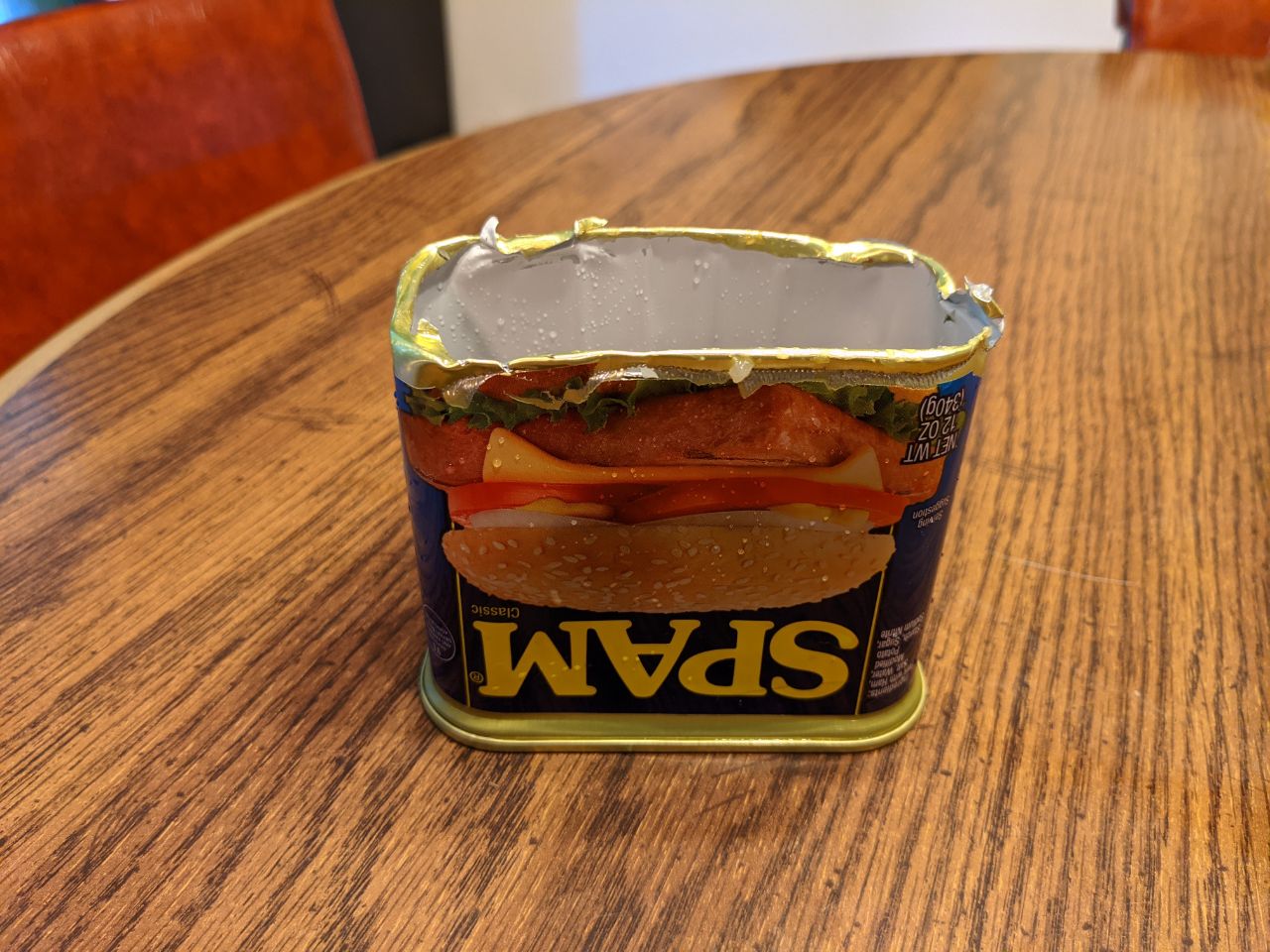 Can of spam with the bottom cut off. Can of spam with the bottom cut off.