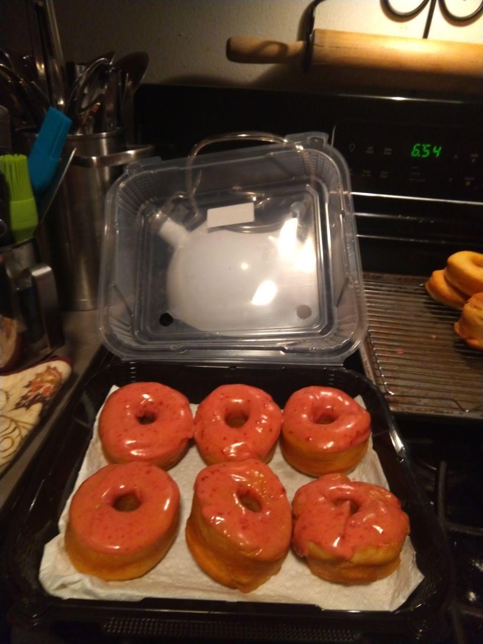 Box of strawberry glazed donuts. A box of strawberry glazed donuts.