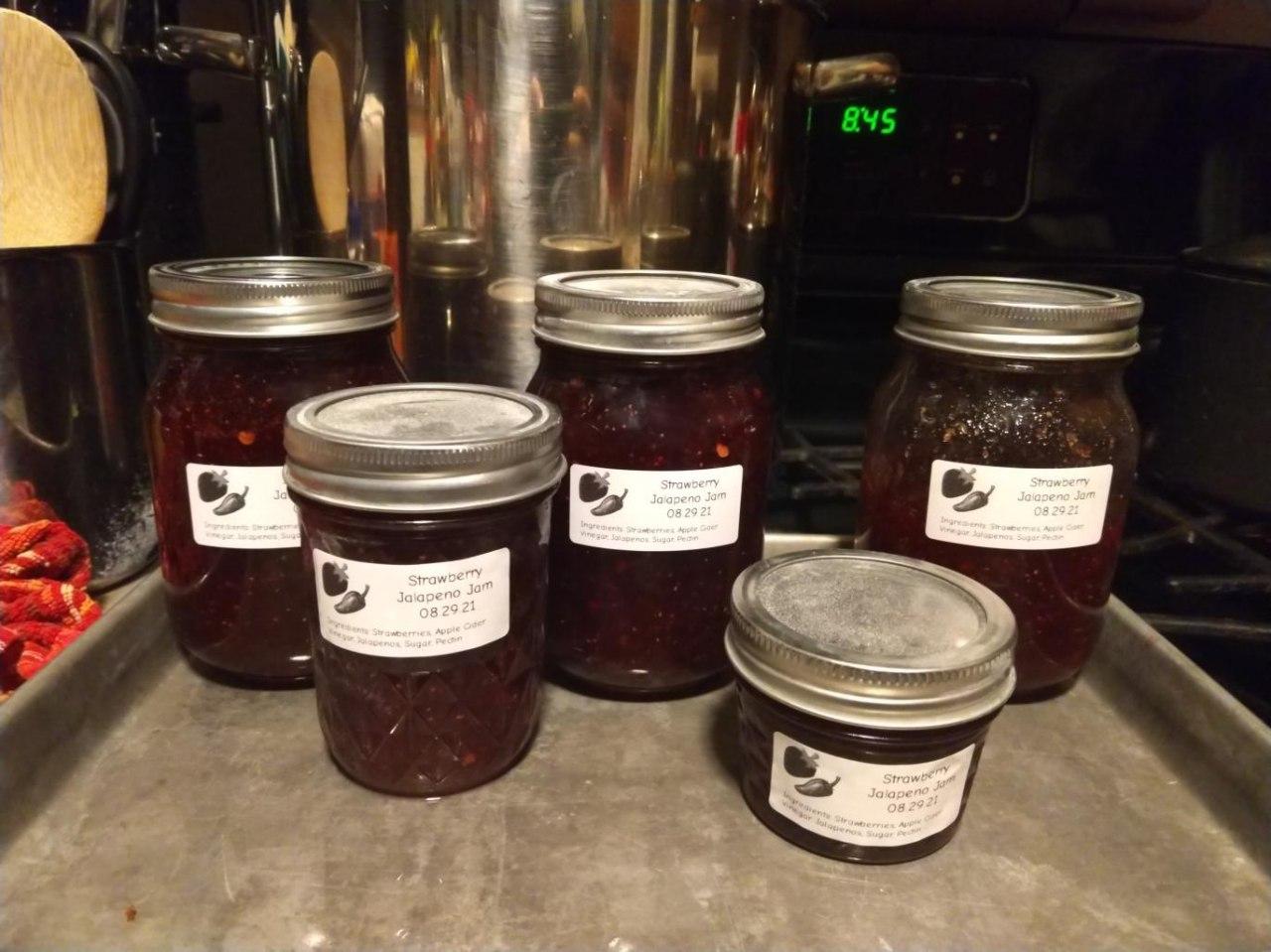 Jars of strawberry jalapeno jam.